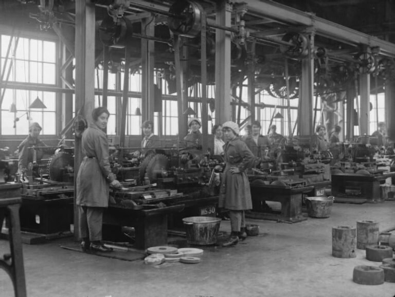 Supply Chain Finance Shifts Working Capital Burden Workers in a factory